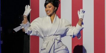 Cardi B Speaks at Kamala Harris Rally in Milwaukee Wearing a White Kristina Fidelskaya Suit and Christian Louboutin Pumps