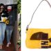 Rihanna Grabbed Dinner in Los Angeles in a Black and White Alexander Wang NY Fur Jacket and Belt with a Yellow Fendi Pony Hair Handbag