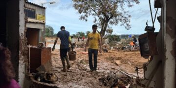Family left with nothing forced to salvage precious memories after home devastated by Spain floods | World News