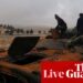 Middle East crisis live: 14 security personnel killed in Syria after clash over former prison officer | Syria