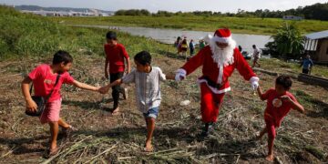 Santa Claus Braves Amazon Jungle To Bring Gifts To Children