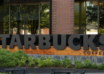 Starbucks workers to strike in three US cities, threaten nationwide action