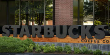 Starbucks workers to strike in three US cities, threaten nationwide action