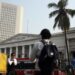 India central bank cuts growth forecast