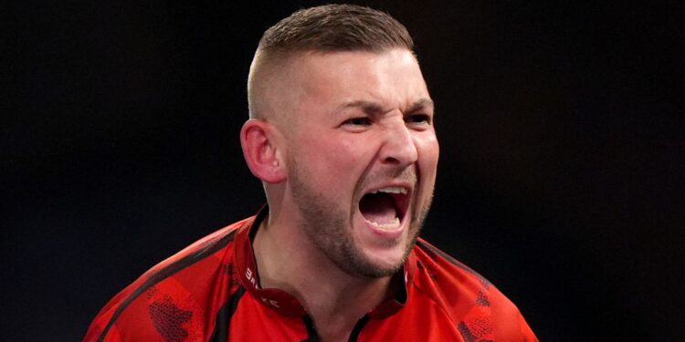 World Darts Championship: Nathan Aspinall earns nervy win as Christian Kist hits nine-darter in defeat | Darts News