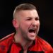 World Darts Championship: Nathan Aspinall earns nervy win as Christian Kist hits nine-darter in defeat | Darts News