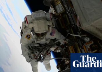 Nasa’s two ‘stuck’ astronauts exit space station for first spacewalk together | Nasa