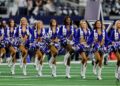 Dallas Cowboys Cheerleader Knocked Down By Football