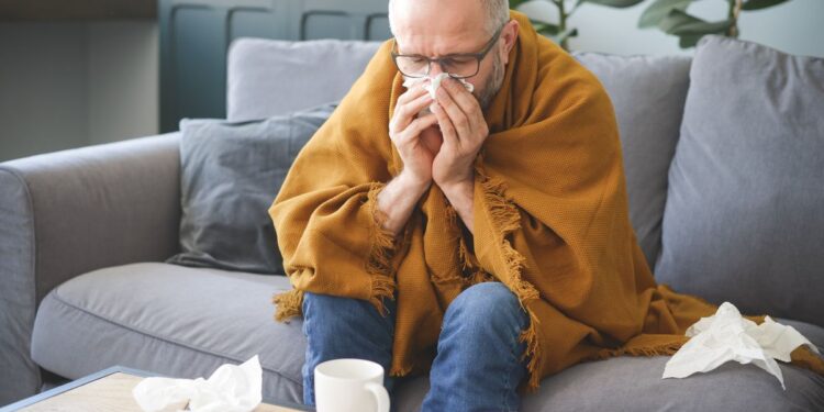 Common COVID-19 Symptoms Doctors Are Seeing In Winter 2025