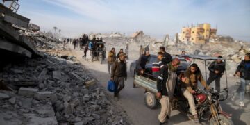 Palestinians Trek Across Rubble To Return Home As Gaza Ceasefire Begins
