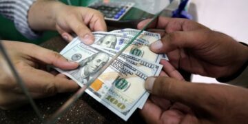 Dollar falls after Donald Trump hints at softer stance on China tariffs