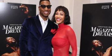 Meagan Good Posed with Her Husband Jonathan Majors in a Red Do Long Official Dress at the ‘Magazine Dreams’ Screening