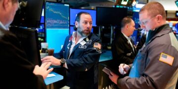 Wall Street stocks steady at end of volatile month despite Trump tariff threats