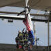 Bungled entry leaves French paratrooper dangling from rugby stadium roof