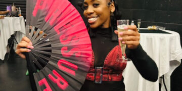 Aleigha Taylor leading a high-energy community dance class at her A Taylor’d EXP event bringing out a crowd of 58 dance students.