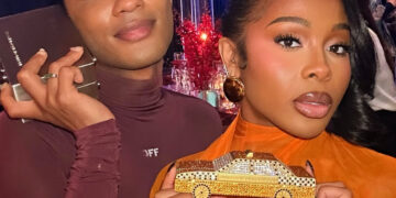 Jayda Cheaves Wears Laquan Smith Orange Spring 2023 Gown and Brandon Blackwood Bomb Accessories to the Black Arts Council Benefit