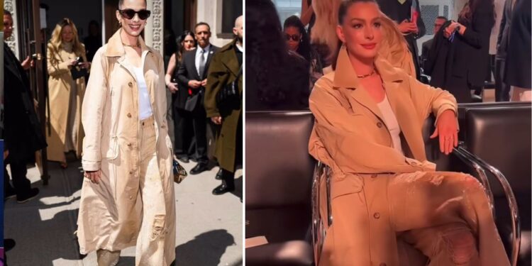 Anne Hathaway Attended the Ralph Lauren FW ’25 Show in a Khaki Trench Coat and Sequined Jeans