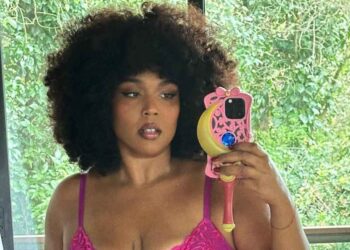 Lizzo Stuns in New Yitty Thong and Hot Pink Lace Bra Set