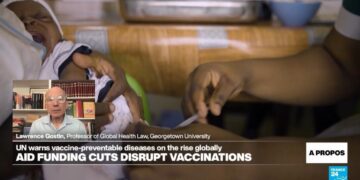 'Many people will die' because of funding cuts and vaccine disinformation, expert says