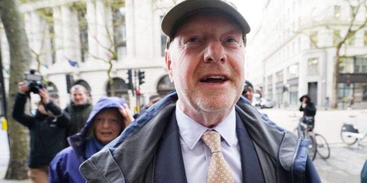 Sir Alan Bates urges victims of Post Office scandal to take govt to court over compensation delays | Money News