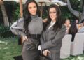 Kim Kardashian Celebrates Law School Graduation in Gray Sweater and a Black Vintage Versace Corseted Skirt