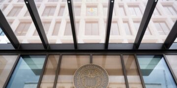 How is the Federal Reserve reacting to Donald Trump’s trade war?