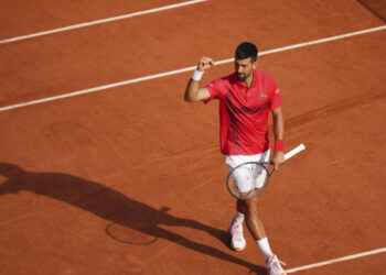 Djokovic reaches historic 100th win at Roland-Garros