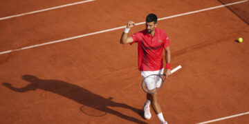 Djokovic reaches historic 100th win at Roland-Garros
