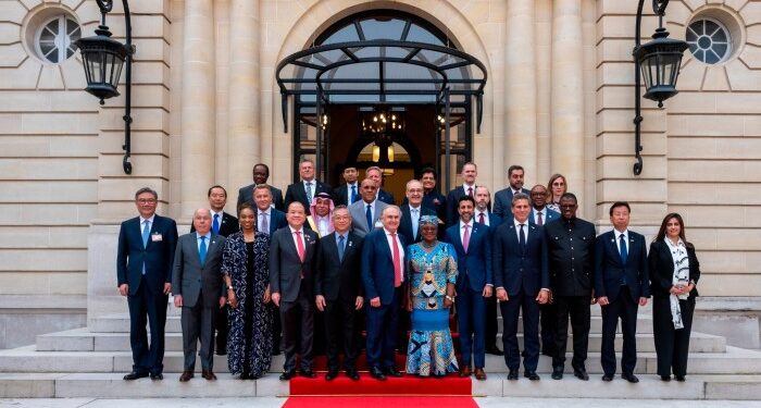 Donald Trump’s go-it-alone trade doctrine shakes Paris summit