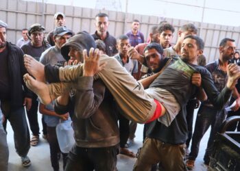 Israeli Troops Kill 32 People Seeking Food At U.S.-Backed Distribution Hubs, Gaza Officials Say