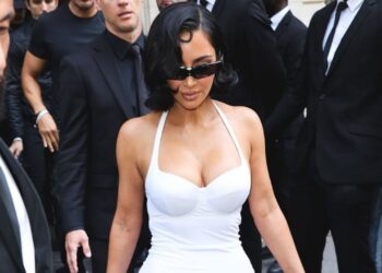 Kim Kardashian Wore a White Balenciaga Monochromatic Look to Paris Fashion Week