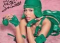 Mariah the Scientist Wears Custom Green SEKS.LLC Look for Hearts Sold Separately Album Art