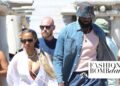 Savannah James Was Captured with Lebron James in Saint-Tropez in a $1,000 Cherry Printed Valentino Bikini with a $933 White Ferragamo Kaftan Shirt
