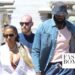 Savannah James Was Captured with Lebron James in Saint-Tropez in a $1,000 Cherry Printed Valentino Bikini with a $933 White Ferragamo Kaftan Shirt