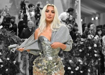 Kim Kardashian Walks The Runway in Elizabeth Taylor’s Earrings