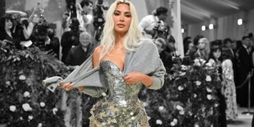 Kim Kardashian Walks The Runway in Elizabeth Taylor’s Earrings