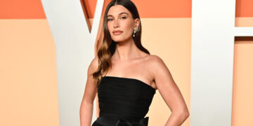 Hailey Bieber Makes The Case For A Rhode Lipgloss Chain Belt