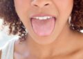 Tongue Scraping: What Is It And Should I Be Doing It?