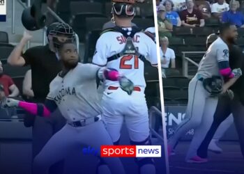 Heated baseball player LAUNCHES bat at pitcher and sparks mass brawl!