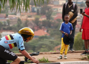Evenepoel cruises past Pogacar to win third straight time-trial cycling world title