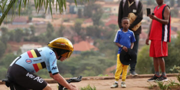 Evenepoel cruises past Pogacar to win third straight time-trial cycling world title
