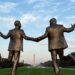 Trump, Epstein Hold Hands In Statue On National Mall