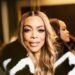 Wendy Williams Spotted at LaQuan Smith NYFW Show win a Black and White Fur Coat with Black Mini Shorts and a Snakeskin Hermes Bag