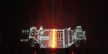 Ferrari unveils chassis of its first electric car, but shares plunge as financial outlook disappoints