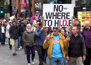 Thousands of protesters march through London streets against digital ID plans | UK News