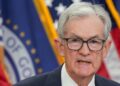 Federal Reserve Cuts Key Rate But Signals Higher Bar For Future Reductions
