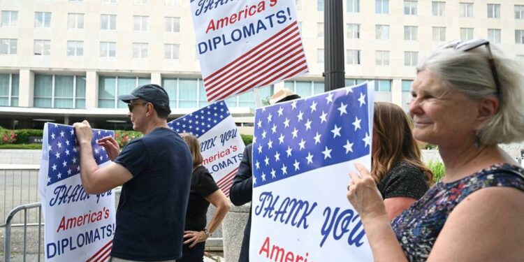 Court Temporarily Blocks Trump From Firing Hundreds of Diplomats