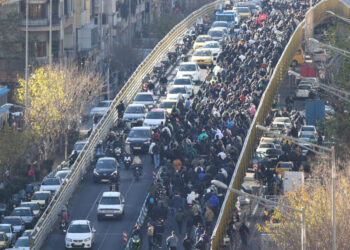 Iranians rally in Tehran as violence intensifies in western regions