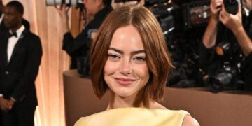 Emma Stone’s Taut Look At The Golden Globes Reignites Wild Speculations
