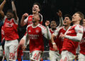 Premier League: Arsenal pass derby test of nerve against Tottenham